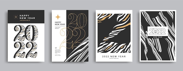 Set di poster di felice anno nuovo 2022 con strisce di tigre carta in bianco e nero con tipografia 2022