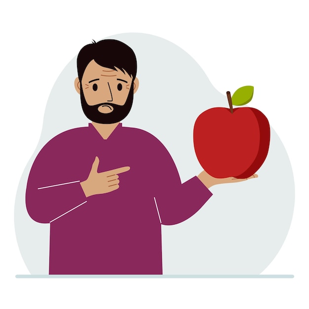 남자는 그의 손에 신선하고 빨간 사과를 들고 남자는 사과를 먹는다 건강 식품 개념