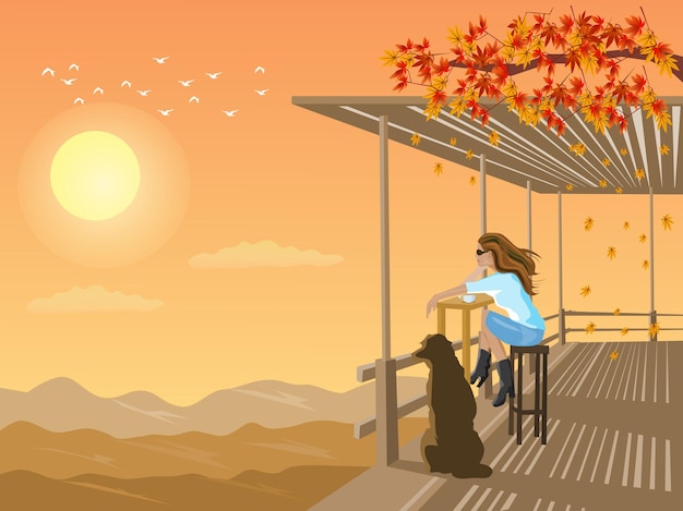 夕焼けを背景に山の竹小屋で夕焼けを眺める女性と犬。