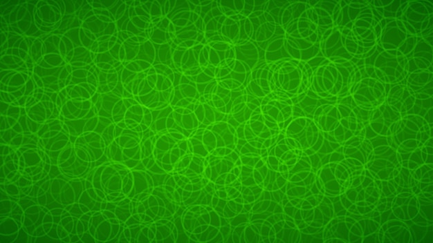 Abstract background of randomly arranged contours of circles in green colors.