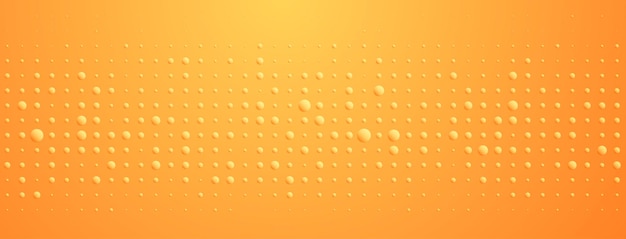 Abstract background in yellow colors made of big and small dots