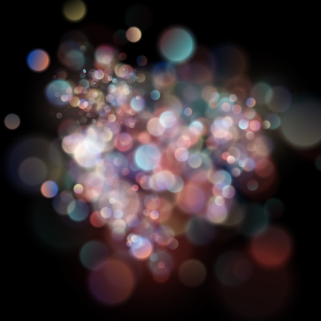 Abstract defocused circular color bokeh on dark background.