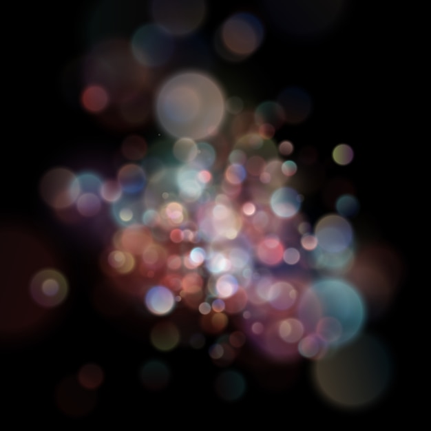 Abstract defocused circular color bokeh on dark background.