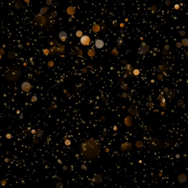 Abstract gold bokeh with black background. glitter defocused abstract twinkly lights christmas template