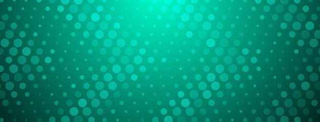 Abstract halftone background made of dots of different sizes in turquoise colors