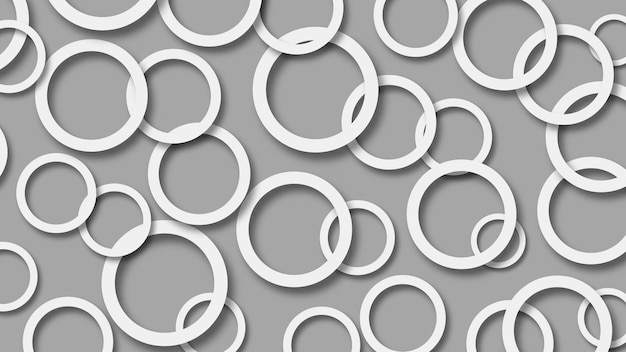 Abstract illustration of randomly arranged white rings with soft shadows on gray background