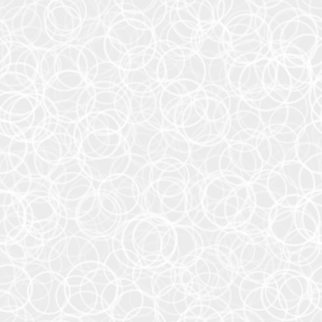 白と灰色の円のランダムに配置された輪郭の抽象的なシームレスパターン