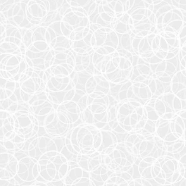 Abstract seamless pattern of randomly arranged contours of circles in white and gray colors