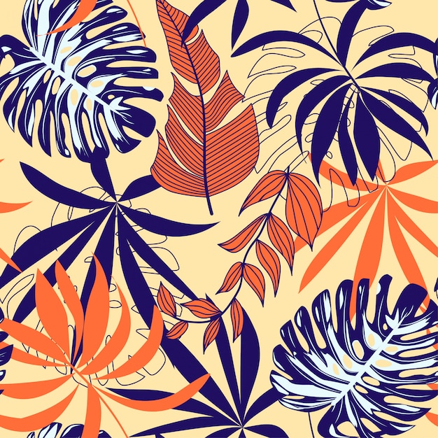 Abstract seamless pattern with colorful tropical leaves and plants on a light background