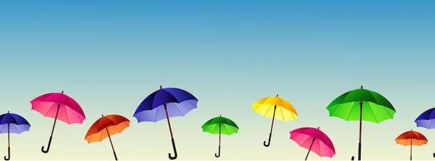 achtergrond van lucht en gekleurde paraplu's