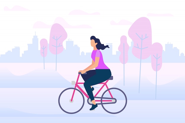 Ragazza alla moda attiva godendo bike ride open air.