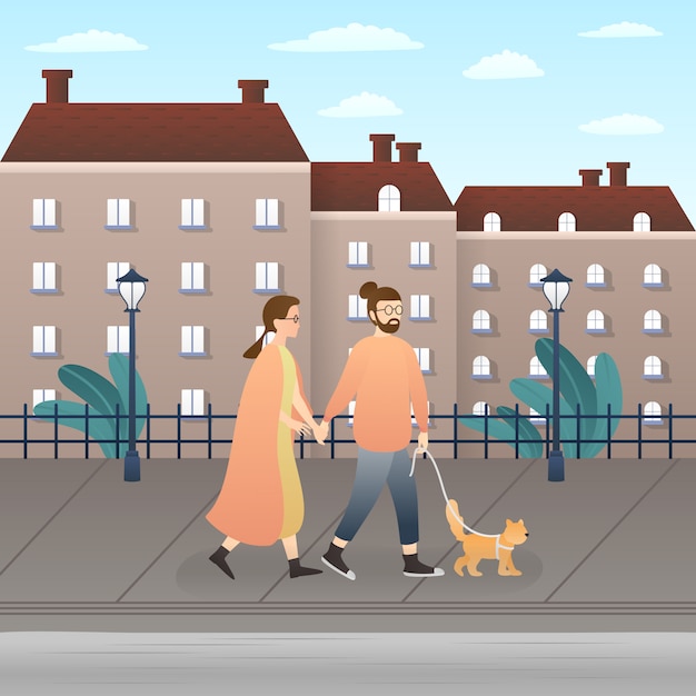 adorable couple walking with their cat in the town.