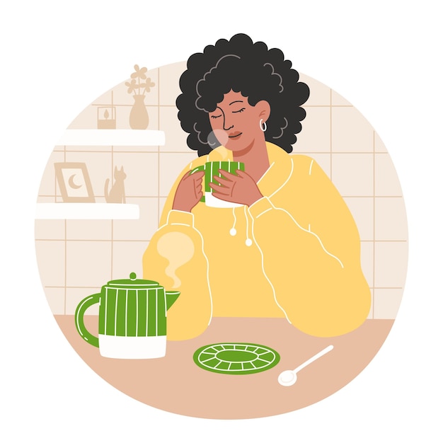 african american woman drinking tea in a cozy kitchen