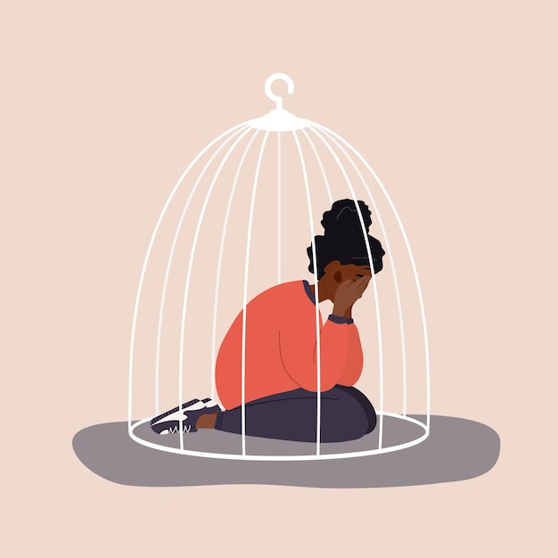 African woman locked in cage. Social isolation concept.