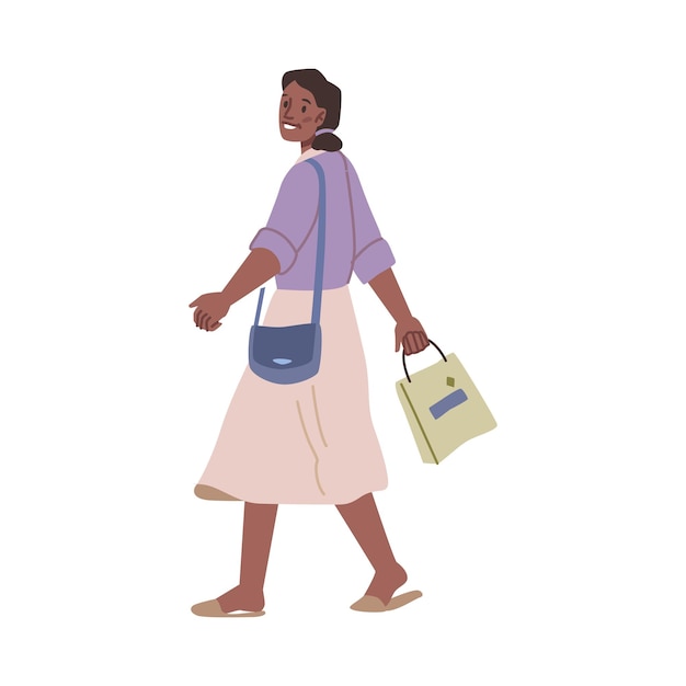 Afro-amerikaanse vrouw die met boodschappentas loopt