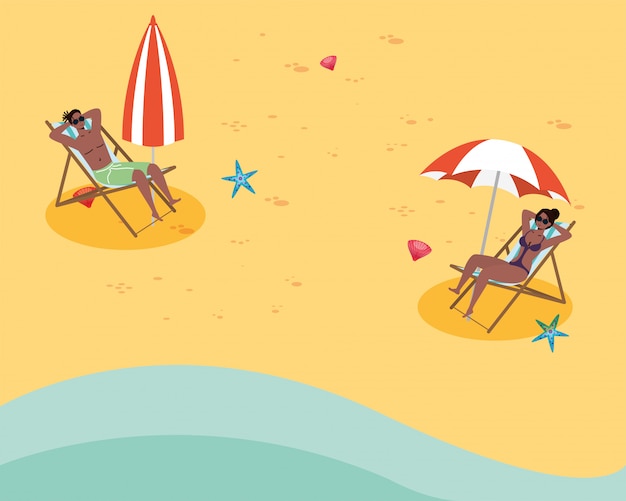 Afro couple seated in beach chairs practicing social distance
