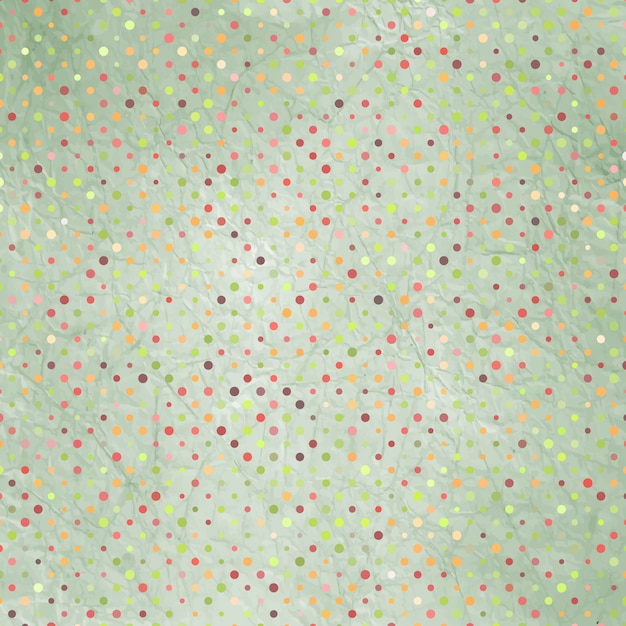 Vector aged and worn paper with polka dots.