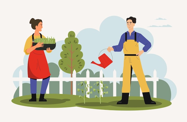 Dipendenti agricoli che lavorano in giardino con utensili