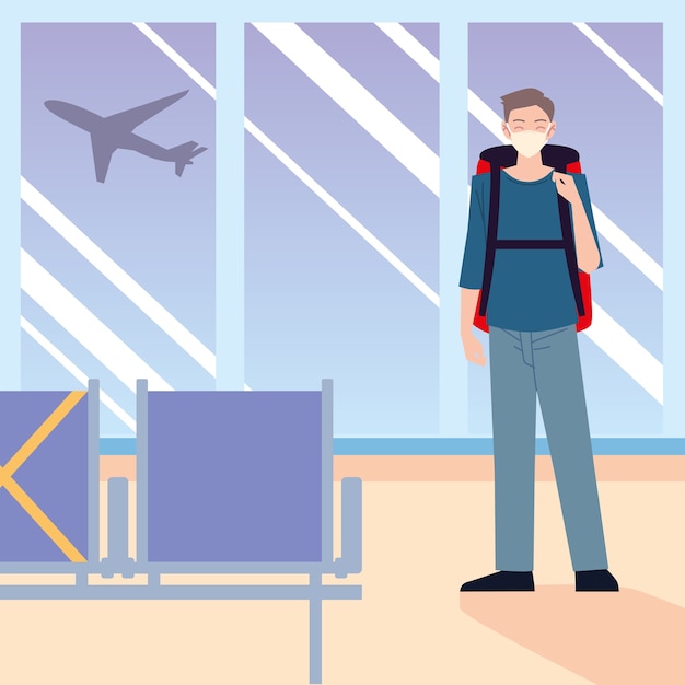 Новый нормальный, одинокий путешественник в аэропорту в маске с багажом