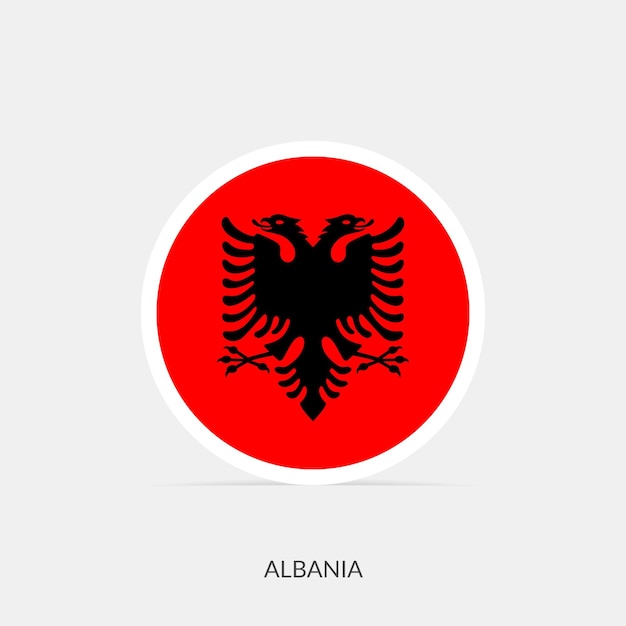 Vettore icona della bandiera rotonda dell'albania con ombra