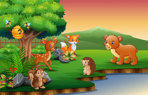 The animals cartoon are enjoying nature by the river