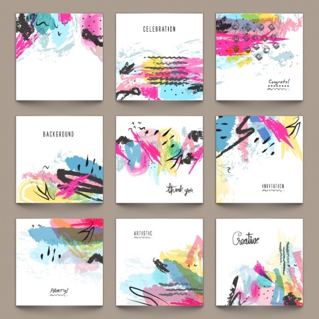 Assortment of invitation cards with colorful stains