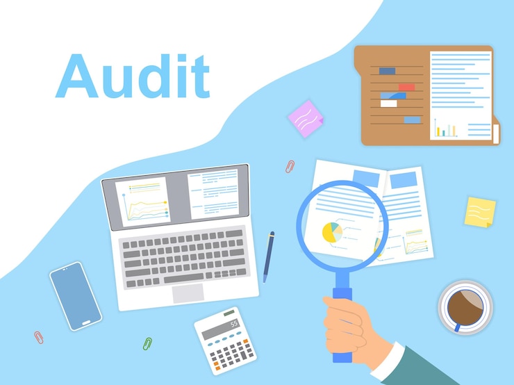 Vector audit and analysis concept with hand holding magnifying glass above an office workspace with laptop