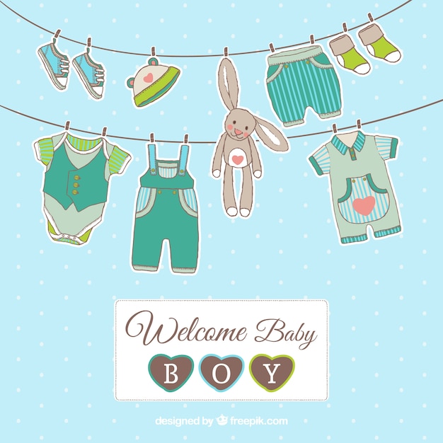 Vector baby boy card with hanging clothes