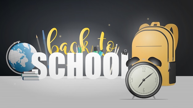 Back to school banner. beautiful lettering, books, globe, pencils, pens, yellow backpack, black old alarm clock.