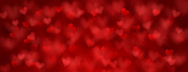 붉은 색의 작은 반투명 흐릿한 마음의 배경 발렌타인 데이를 위한 그림