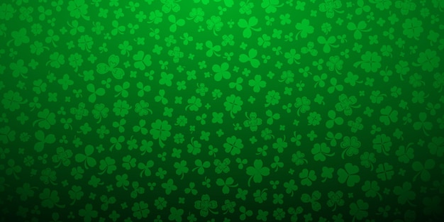 Background on St Patrick's Day made of clover leaves in green colors