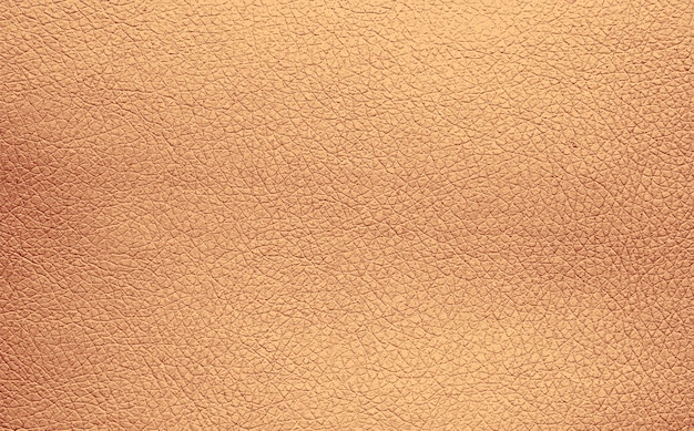 background texture pattern of beige natural leather grain