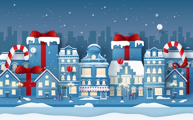 Vector background of urban town with christmas gift in winter season