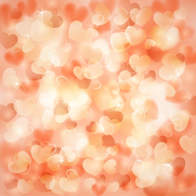 Background with many small hearts color of a peach and sparkles