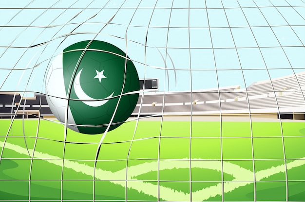 Una palla che colpisce un goal con la bandiera del pakistan