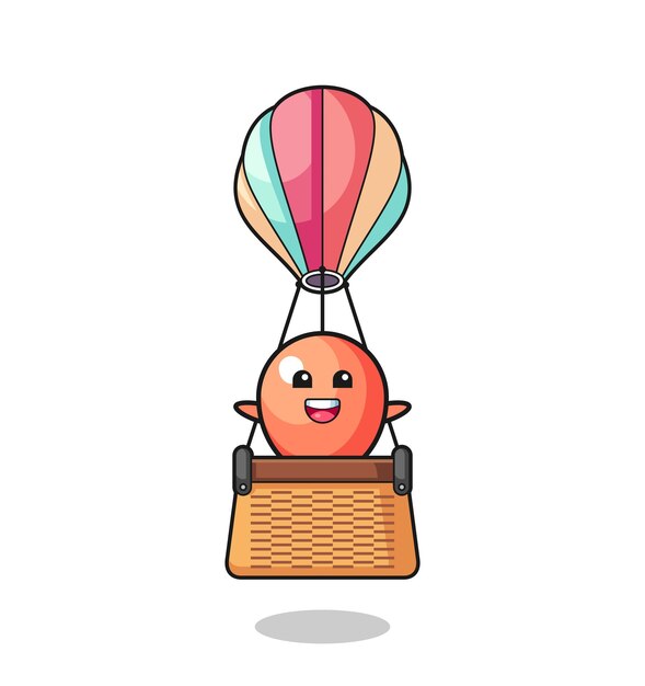 Ballonmascotte die op een schattig ontwerp van een heteluchtballon rijdt