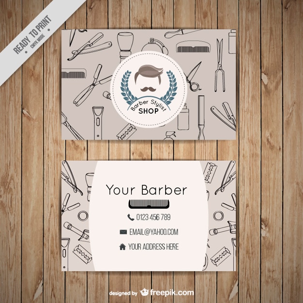 Vector barber shop business card with outlined tools