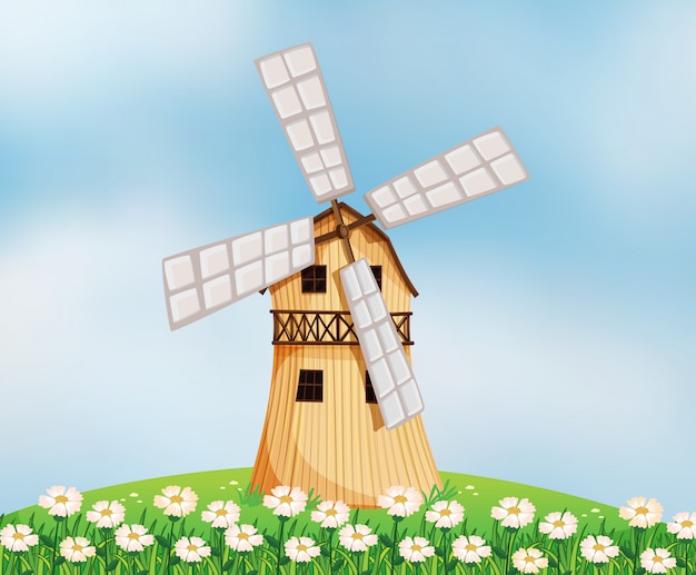 A barn with a windmill