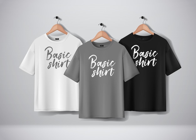 Basic zwart grijs en wit korte mouwen t-shirts mockup kleding set hangen geïsoleerd