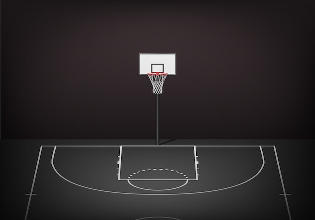 Basketball hoop on empty black court.