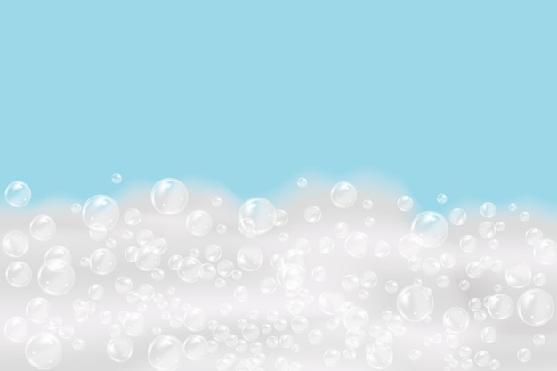 Bath foam isolated on blue background. Shampoo bubbles texture.