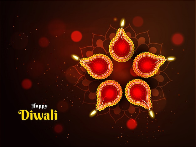 Beautiful decoration on the occasion of diwali festival with illuminated oil lamps (diya)