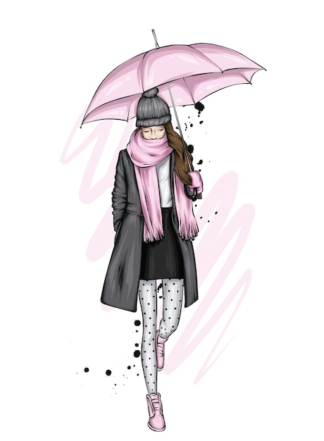 Bella ragazza in un cappotto e con un ombrello