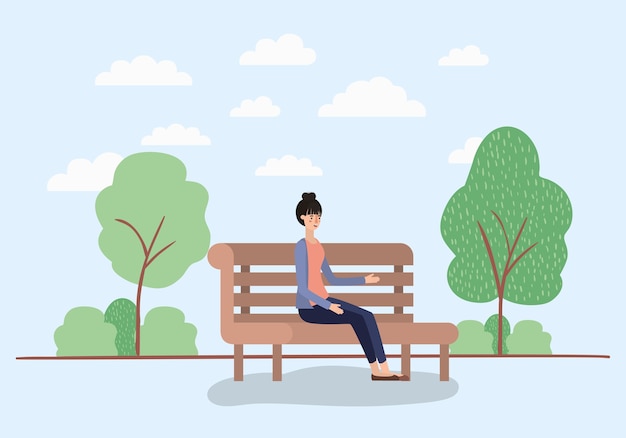 beautiful woman sitting on park chair
