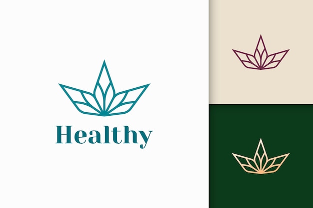 Logo di bellezza o salute a forma di fiore adatto per prodotti vitaminici o sieri