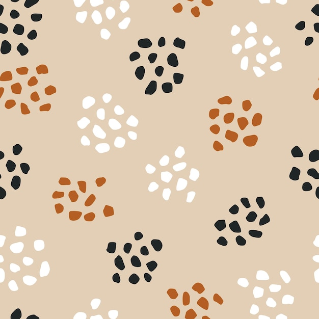 A beige background with black and white dots and a brown circle.