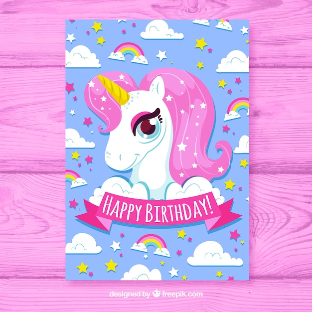 Vettore carta birhtday con stile disegnato unicorno in mano