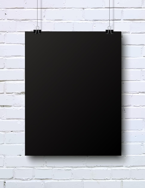 Vector black blank vertical piece of paper on the white brick wall