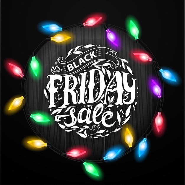 Black friday sale. lettering with christmas garland