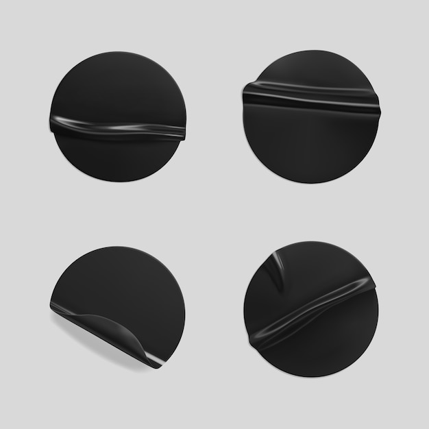 Vector black glued round crumpled stickers set